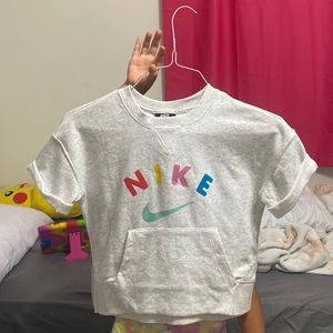 Cute kids Nike shirt with a hoodie pocket